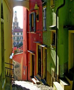 a view of an alley with colorful buildings at Sea Apartment in Sanremo