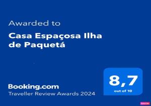 Сертификат, награда, вывеска или другой документ, выставленный в Casa Espaçosa Ilha de Paquetá