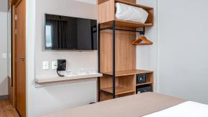 Plaza Hotel & Boulevard Convention - Vale dos Vinhedos客房内的一张或多张床位