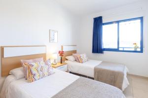Posteľ alebo postele v izbe v ubytovaní Alicante Hills Premium