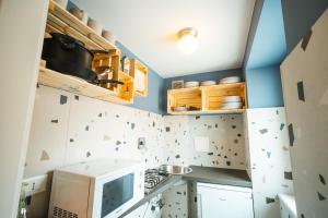 Кухня или мини-кухня в Hurban Apartments Muggia
