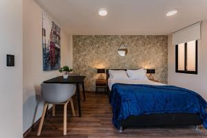 Ένα ή περισσότερα κρεβάτια σε δωμάτιο στο Sonora 11 Apartments by VH