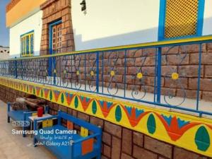 a wall with bikes on the side of a building at Resort Nubian Cataract in Aswan