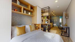 Letto o letti in una camera di The Cabrera Eighty Fifth Hotel