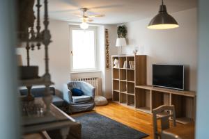 Телевизор и/или развлекательный центр в Hurban Apartments Muggia
