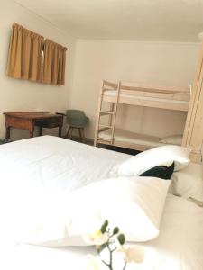 Postel nebo postele na pokoji v ubytování L'auberge Camarguaise