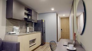 Cucina o angolo cottura di The Cabrera Eighty Fifth Hotel