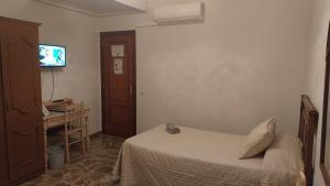 Posteľ alebo postele v izbe v ubytovaní Magdeleine Village