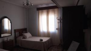 Posteľ alebo postele v izbe v ubytovaní Magdeleine Village