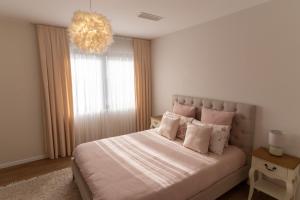 מיטה או מיטות בחדר ב-Splendide villa proche de Colmar
