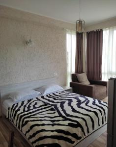 Voodi või voodid majutusasutuse Tornado Hotel toas