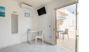 TV a/nebo společenská místnost v ubytování Briciola's rooms