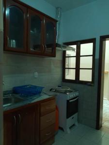 Kuchyň nebo kuchyňský kout v ubytování Appartement entier Mindelo