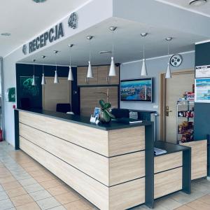 a cashier counter in a grocery store at Hotel Galion in Gdańsk