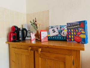 a counter top with food and boxes on it at Appartement Lanslebourg-Mont-Cenis, 2 pièces, 4 personnes - FR-1-508-186 in Lanslebourg-Mont-Cenis