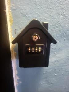 a black bird house on the side of a wall at VIP апартаменты на Жукова in Uralsk