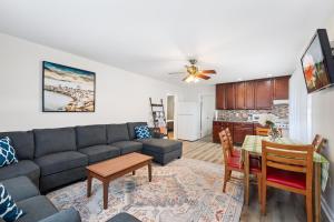 a living room with a couch and a table at Lukas Apartments in Ocean City