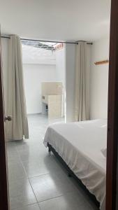 Katil atau katil-katil dalam bilik di Casa linda San Carlos
