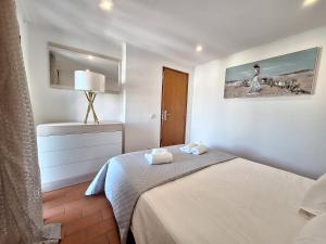 Кровать или кровати в номере Casinha do sul