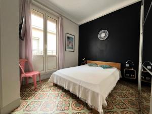 Un pat sau paturi într-o cameră la Résidence Vue sur le Canal - maeva Home - Appartement 3 pièces 4 personnes 801