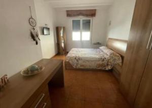 Ένα ή περισσότερα κρεβάτια σε δωμάτιο στο @casa_la_cala