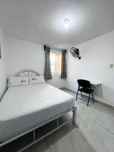 Tempat tidur dalam kamar di Preciosa,encantadora,espaciosa y moderna casa wifi