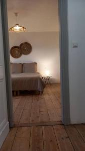 Posteľ alebo postele v izbe v ubytovaní Maison de prestige de la Heanne