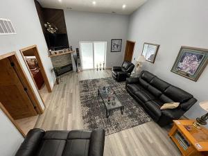 a living room with a couch and a table at MJSmith Rentals in Ogallala