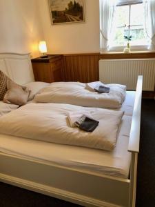 Postel nebo postele na pokoji v ubytování Haus Heidetal