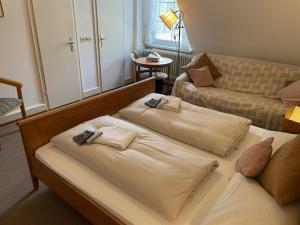 Postel nebo postele na pokoji v ubytování Haus Heidetal