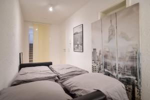 Voodi või voodid majutusasutuse Secret escape above Stuttgart toas