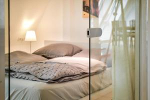 Voodi või voodid majutusasutuse Secret escape above Stuttgart toas