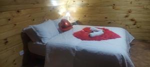 Krevet ili kreveti u jedinici u okviru objekta Chale com hidromassagem da Vick