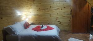 Postel nebo postele na pokoji v ubytování Chale com hidromassagem da Vick