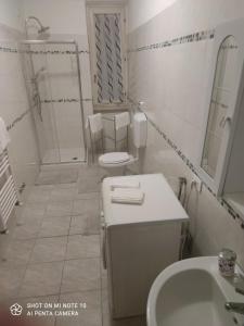 Koupelna v ubytování Genysweethome + 17 fotografií