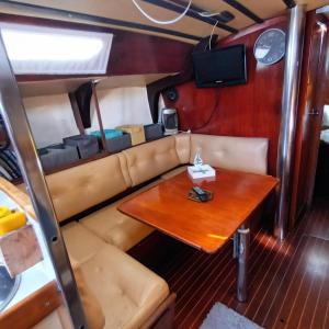 a dining table in the back of a boat at Spirit of Shackleton yacht in Puerto Calero