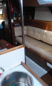 a sink in the back of a boat with seats at Spirit of Shackleton yacht in Puerto Calero