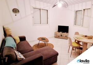 TV a/nebo společenská místnost v ubytování Les Hauts de Devarieux - Harmonie & Horizon
