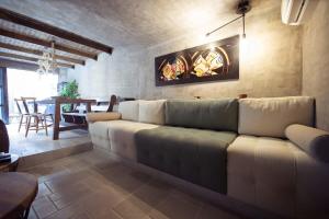 a living room with a couch and a table at Lovely 2BR Villa with Ocean View in Cartagena in Cartagena de Indias