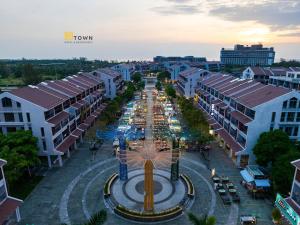 an aerial view of a street in a city at Luxy Park Hotel & Apartments - MTown in Phu Quoc