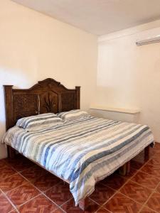 Llit o llits en una habitació de Hotel Costa Mar