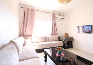 Posezení v ubytování appartement confort calme propre