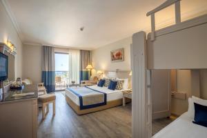 Postel nebo postele na pokoji v ubytování Hotel Turan Prince - Ex Sentido Turan Prince