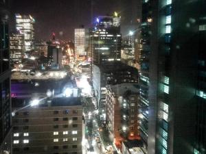a view of a city at night with lights at Amazing 1B1B Apt w/Pool, Gym, Sauna in Brisbane