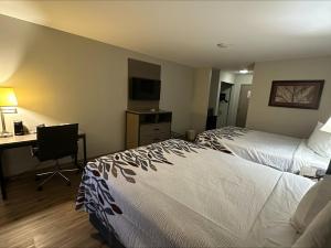 Postel nebo postele na pokoji v ubytování Red Roof Inn Gurnee - Waukegan