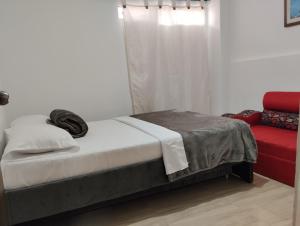 Postel nebo postele na pokoji v ubytování Apartamento sarita centro