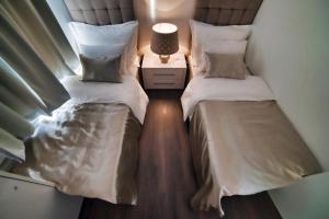 Posteľ alebo postele v izbe v ubytovaní CASA V BENCUN Luxury Apartments