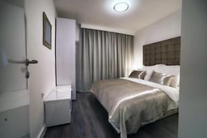 Posteľ alebo postele v izbe v ubytovaní CASA V BENCUN Luxury Apartments