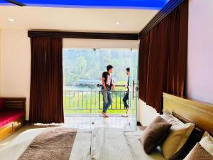 Letto o letti in una camera di Green view suits