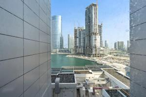 a view of a city from a building at Silkhaus Spacious 1 BDR Al Fay Park Nearby in Abu Dhabi